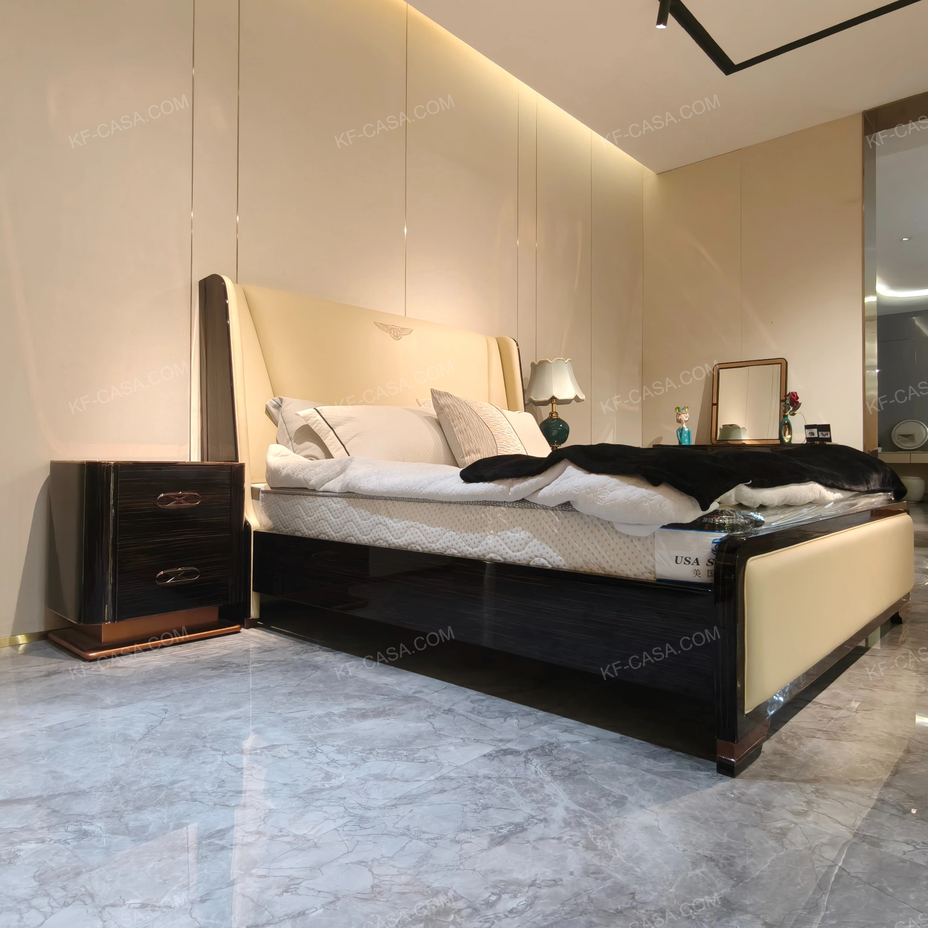 Cream Leather Upholstered Bed with Dark Natural Wood Veneer Trim, Embossed Brand Emblem & Copper-Accented Hardware